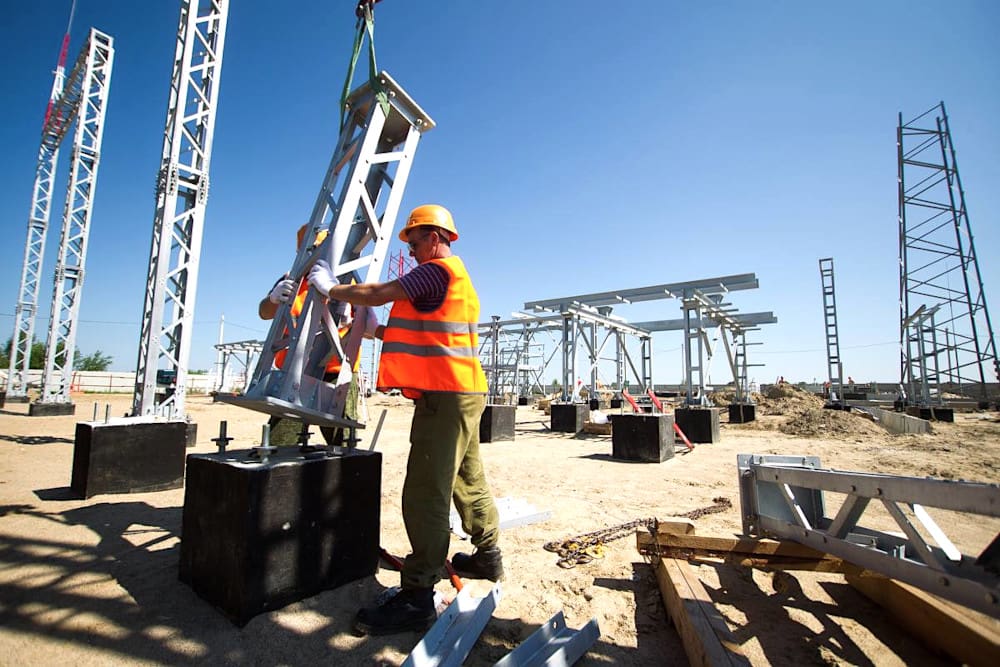 Preparing equpment poles for installing on prepared foundations
